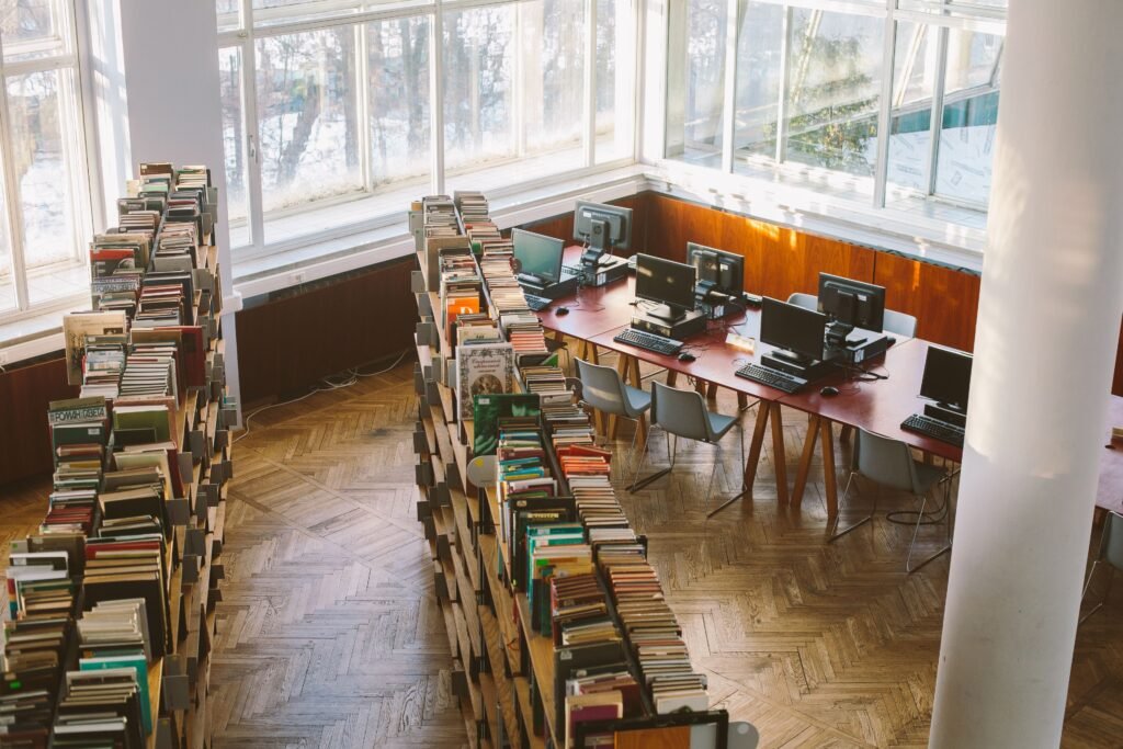 University library with study desks and bookshelves