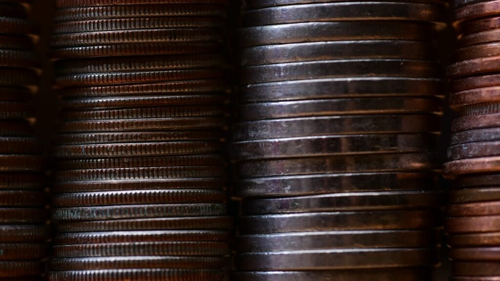 Close-up of several stacks of metal coins.